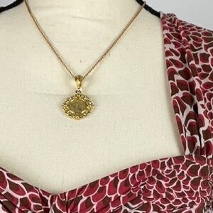 Gold Tone Face Filigree Pendant Necklace